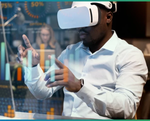 Un homme équipé d’un casque de réalité virtuelle manipule des graphiques numériques, plongeant au cœur d’une expérience immersive où technologie et interaction se rencontrent | wdata-mg.info